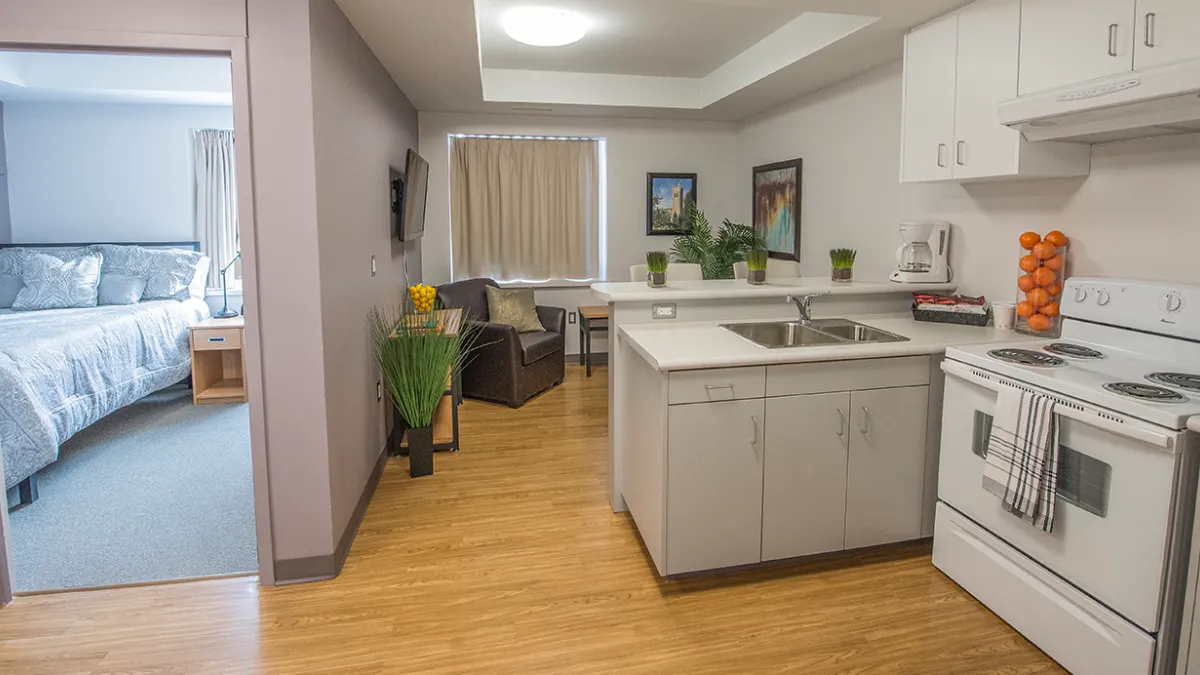 View of Ontario Hall Suite looking at kitchen and living room